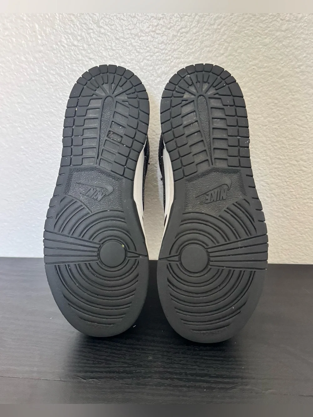 Children’s Nike Dunk Low black and white tennis shoes